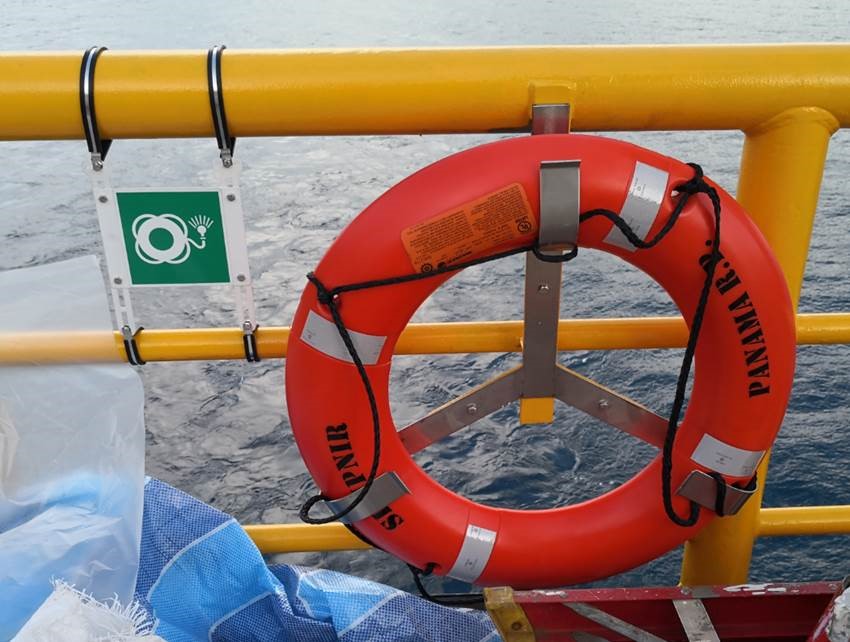 Photoluminescent emergency exit signs that glow in darkness for evacuation safety and power outage visibility