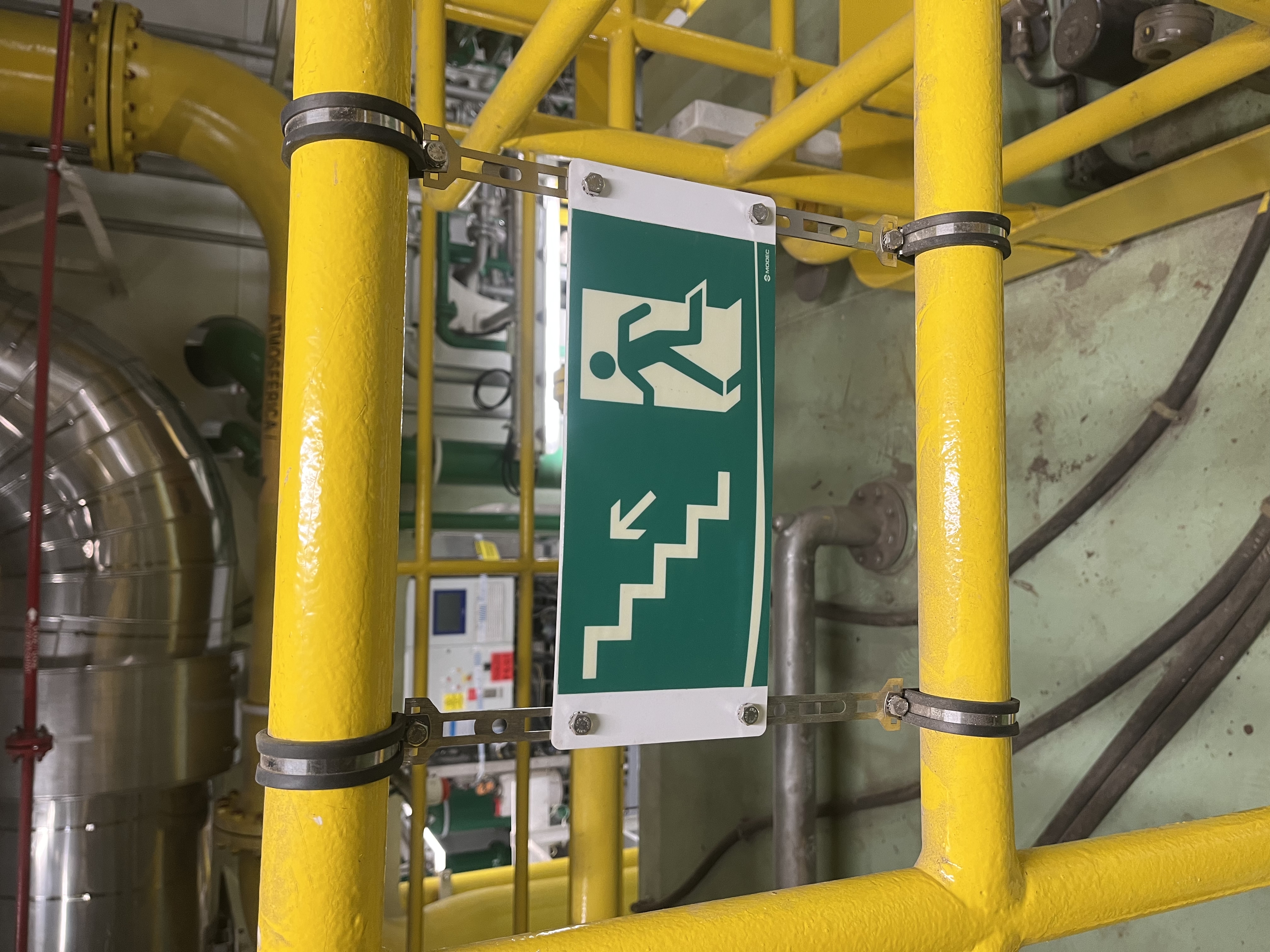 High-visibility non-photoluminescent workplace safety and warning signs with standardized ISO symbols