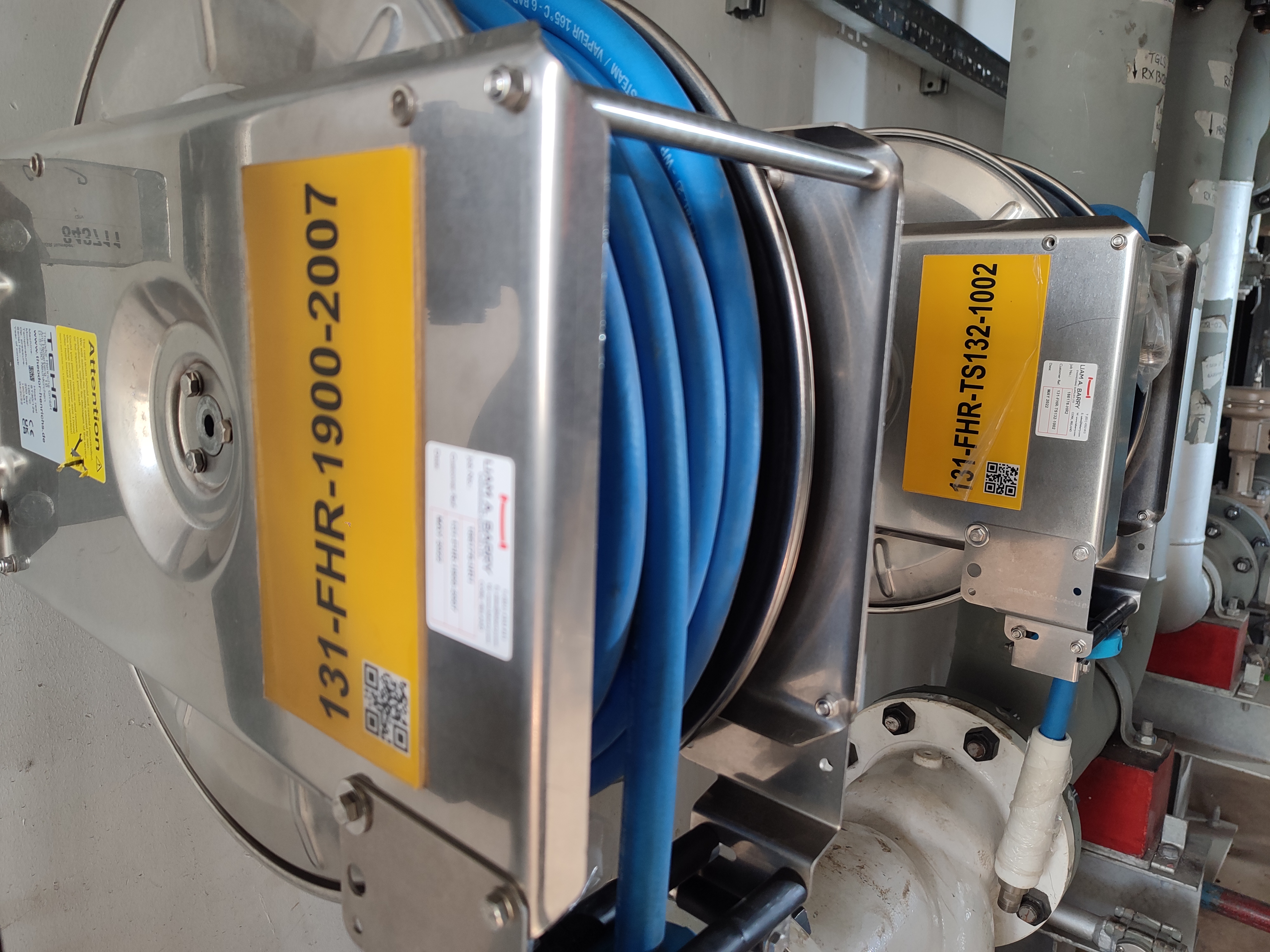 Large-format reverse-laminated acrylic equipment signs with strong adhesive backing for machinery identification